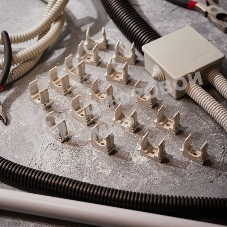 Крепеж-клипса для монтажного пистолета Rexant Ø 25 мм, серая (50 шт/уп)